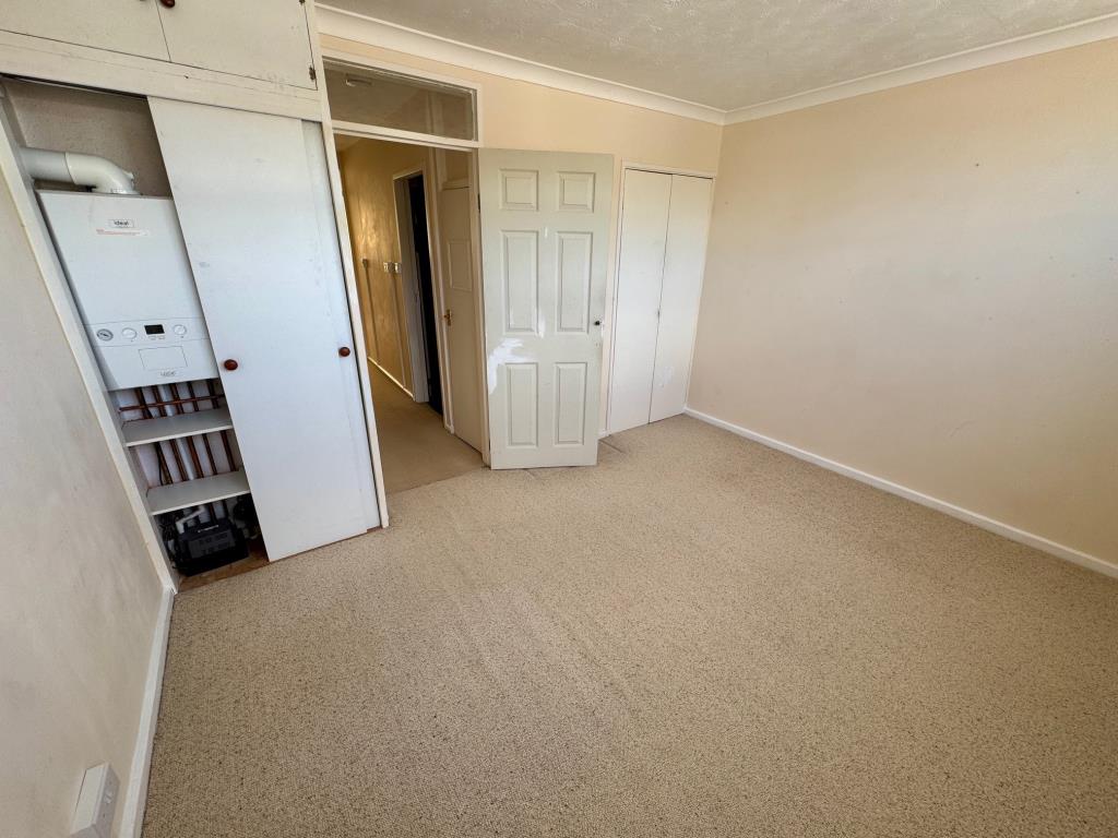 Lot: 113 - TWO-BEDROOM MAISONETTE FOR REDECORATION WITH GARAGE EN-BLOC - Bedroom 2
